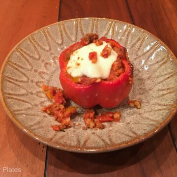 Stuffed Bell Pepper topped with Mozzarella and then baked