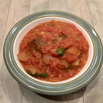 Tomato and Bread Soup served in green bowl